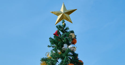 3d star christmas tree topper on a christmas tree
